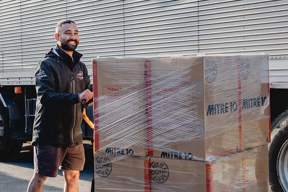 NZ Moving Services team loading wrapped freight ready to load