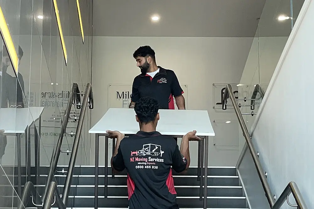 Carrying desks upstairs for an office move