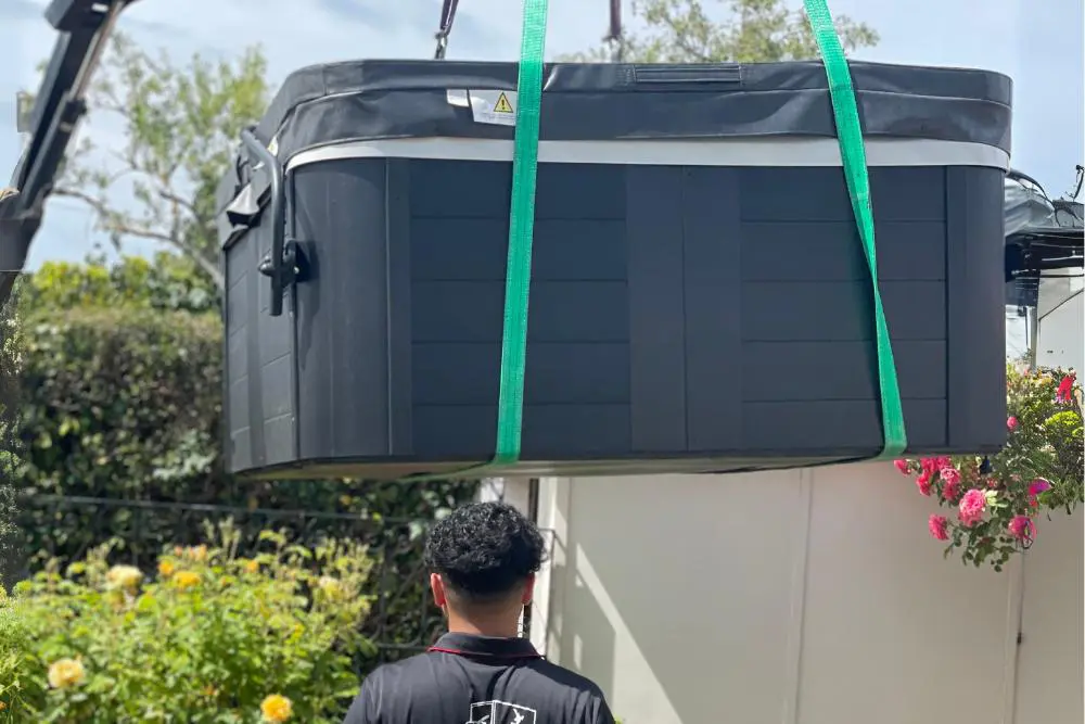 Single item movers carefully transporting a spa pool
